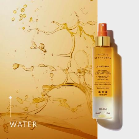 Двухфазная солнцезащитная вода Adaptasun *** Institut Esthederm Adaptasun Hydra-Protective Sun Water