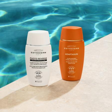 Флюїд при пігментації PhotoReverse Блокування засмаги New Formula Institut Esthederm Photo Reverse Protective Anti-Dark Spots Brightening Sheer Fluid