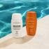 Флюїд при пігментації PhotoReverse Блокування засмаги New Formula Institut Esthederm Photo Reverse Protective Anti-Dark Spots Brightening Sheer Fluid